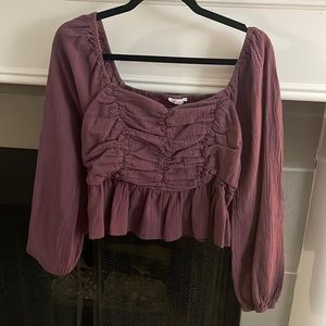 Purple long sleeved top